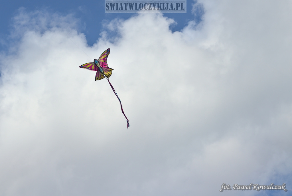 Kite floating in the sky in the shape of a colorful butterfly